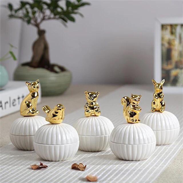 White Round Ceramic Candy Jar With Gold Animal Lid